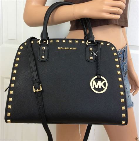 michael kors black rose purse|Michael Kors gold handbag sale.